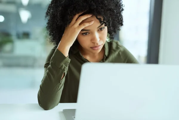 woman frustrated by slow loading website